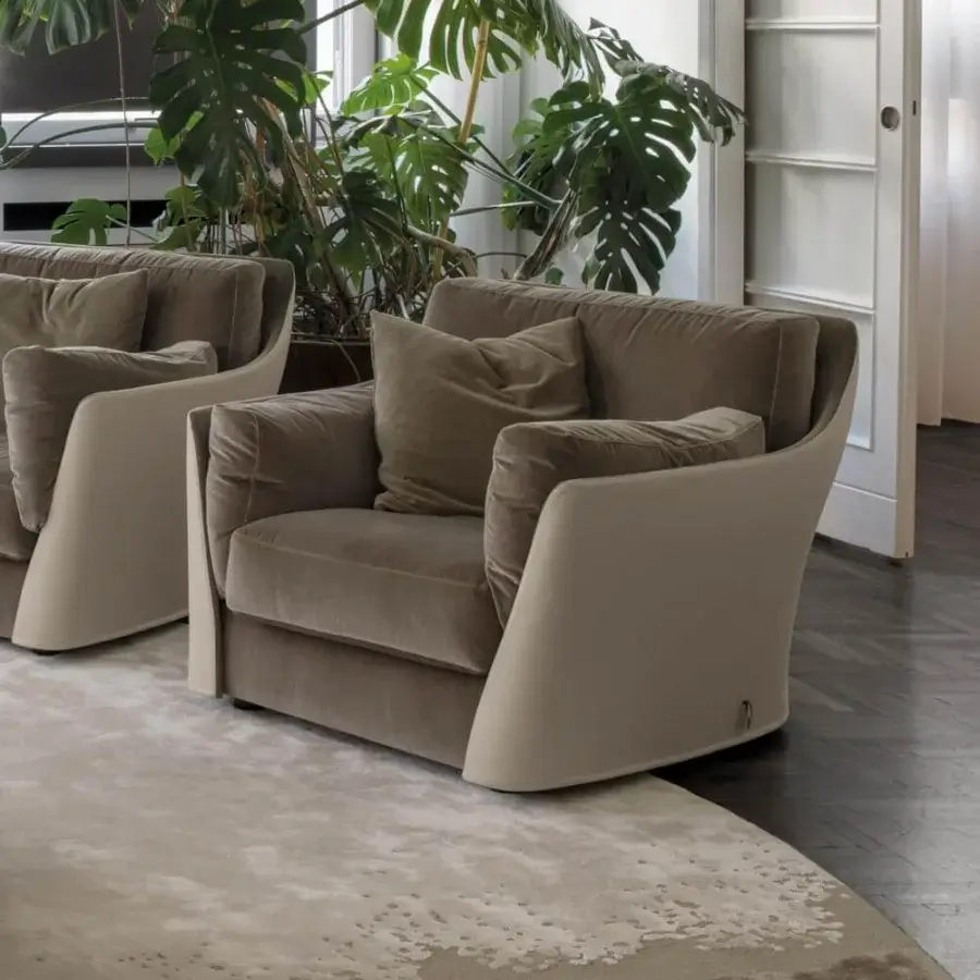 Exceptional Giorgetti Vittoria lounge chair with muted taupe textile and lighter beige shell, exhibiting curved edges and removable fabric covers