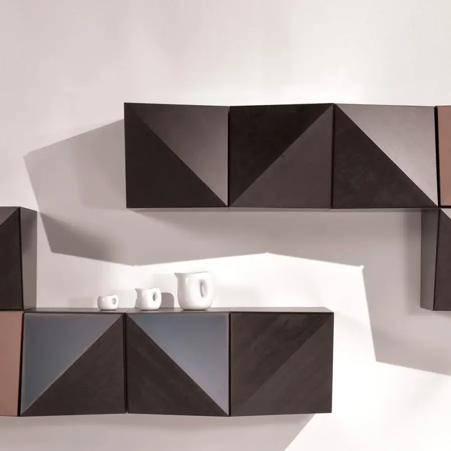 Distinguished Reflex Origami wall unit built in Canaletto walnut with a matt lacquered finish and geometric facets