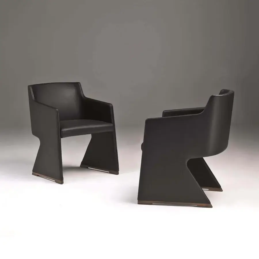 Distinguished 4 Mariani Ophy armchair fully covered in sleek black synthetic with horizontal black walnut wood detail