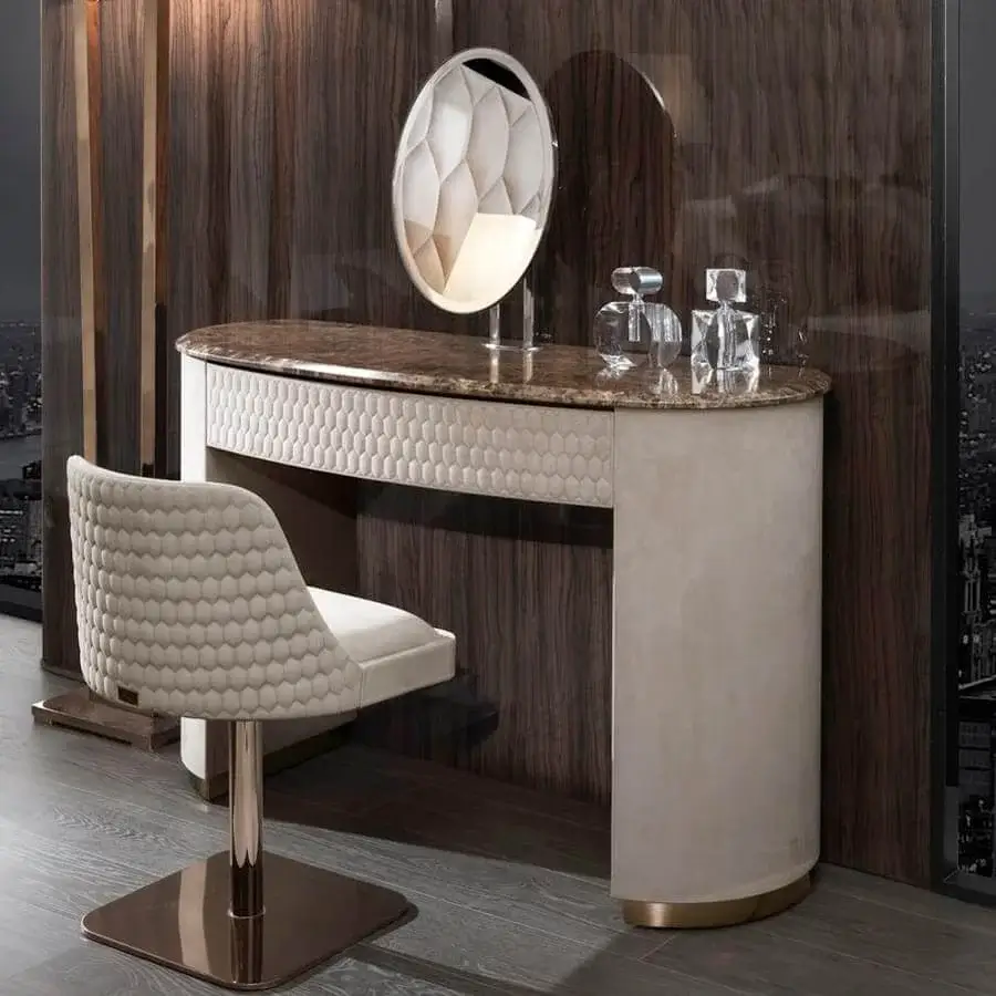Refined DV Home Collection Charlotte vanity with cream leather and beechwood plywood, showcasing hexagon quilted finish with glossy lacquered marble