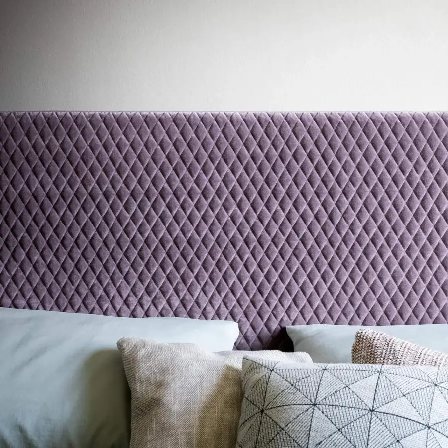 Superior Bonaldo Thin bed with quilted purple textile and subtle color contrasts offering a contemporary aesthetic