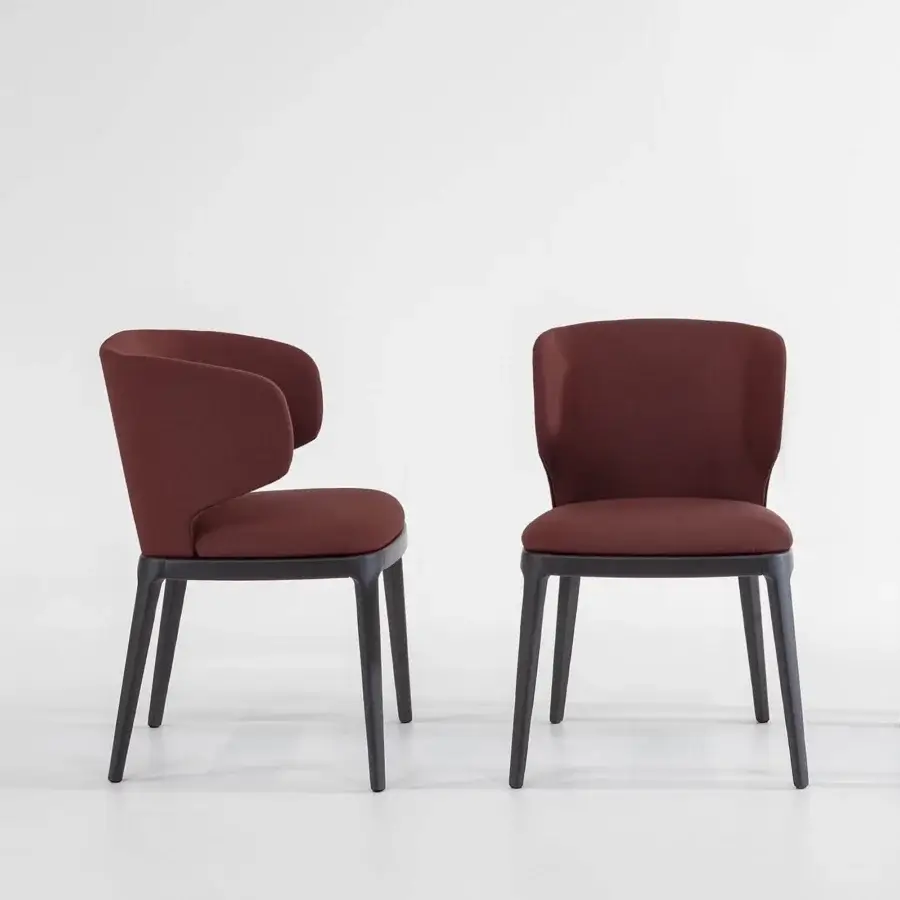 Distinguished Bonaldo Joy chair with a reassuring shape upholstered in dark reddish-brown textile and solid wood base