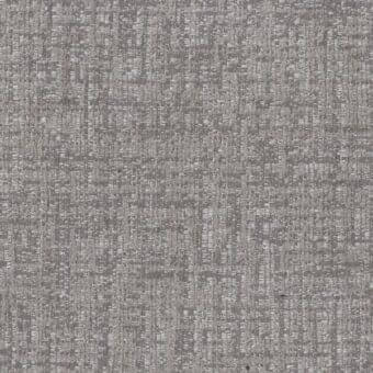 Mariani Brando fabric texture, medium gray woven material, subtle irregular pattern, rectangular label with product details visible.