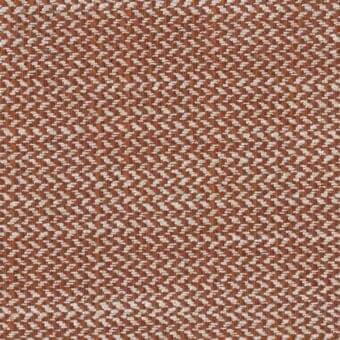 Terracotta basketweave fabric sample with off-white speckled texture, displaying repeated “Chancas” motif and “mariani” label details.
