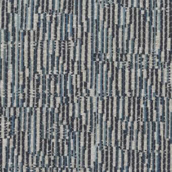 Mariani Elettra fabric sample displaying dark charcoal and teal vertical stripes with a nubby texture and complex weave construction.