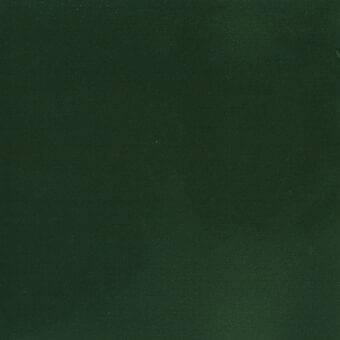 Dark green velveteen fabric with a textured weave and dense pile, displaying subtle tonal variation and small light-colored flecks.