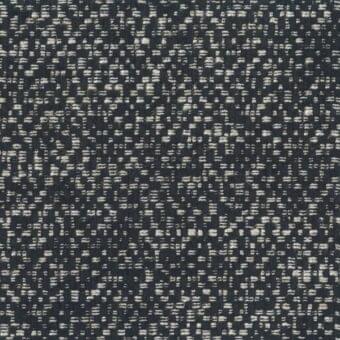 Mariani Camilla fabric texture, light beige speckled pattern on dark charcoal gray, tight woven matte finish with nubby surface.
