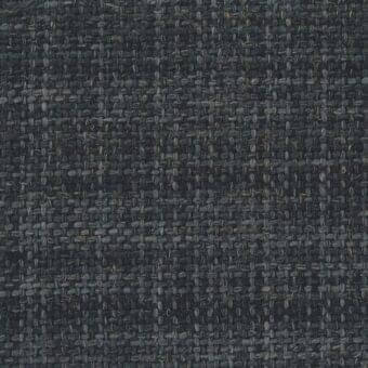 Gunnar fabric sample, dark charcoal gray, heathered texture with muted gold flecks, irregular weave, matte finish, Mariani collection.