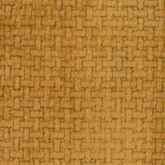 Mustard yellow fabric texture with a dense, nubby weave of small squares and rectangles; label reads “mariani > fabric > le fate”.