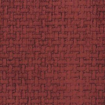 Terracotta woven fabric sample with a raised, geometric grid pattern; features “t le fate” text and a matte, natural fiber texture.