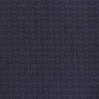 Mariani Le Fate fabric texture, dark purple woven textile with irregular square and rectangle mosaic pattern, looped pile surface.