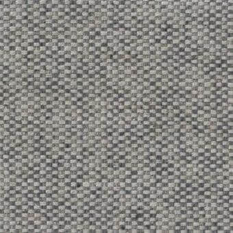 Woven gray fabric texture features a dense grid pattern with heathered tones, displaying a matte finish and substantial weight; label reads “mariani.”