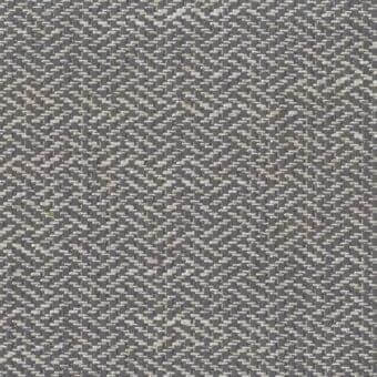 Mylos fabric texture, gray and beige geometric weave, dense chevron pattern, matte finish, Mariani collection textile.