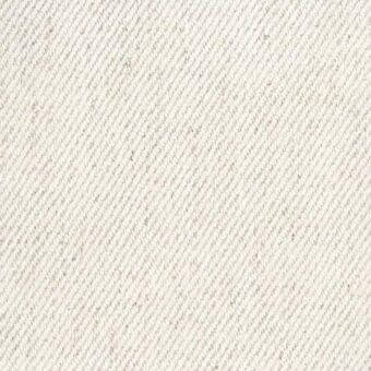 Cream woven fabric texture, Nadir by Mariani, displays diagonal ridges and a matte finish with subtle tonal variations in the weave.