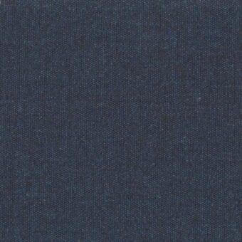 Woven fabric texture, muted blue-gray, heathered with dark flecks, dense plain weave, Mariani Ronny 804 label visible, diffused lighting.