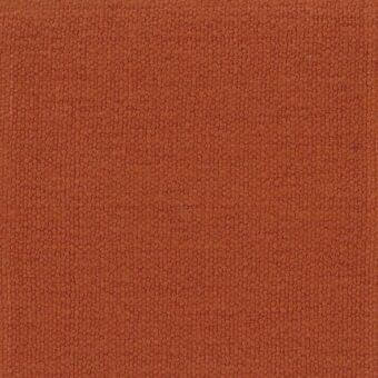Terracotta fabric texture with a granular surface, displaying mottled warm orange tones and a consistent pattern of small raised dots.