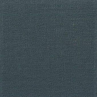 Dark gray fabric texture with granular surface, densely packed spherical elements, matte finish, neutral background, studio shot.