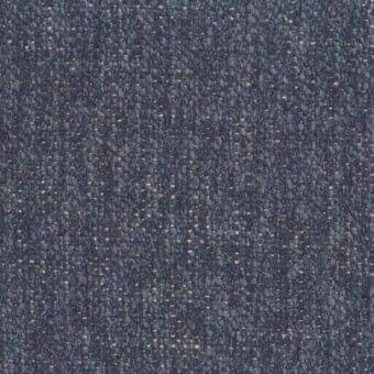 Woven fabric sample in dark blue-gray with golden-yellow flecks, displaying a multi-directional, granular texture and subtle horizontal lines.