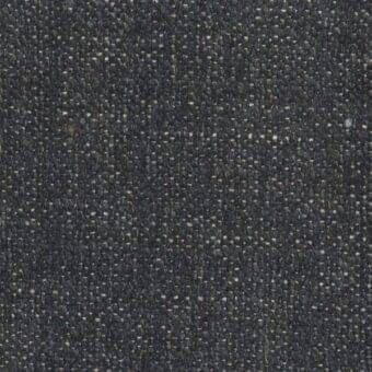 Dark charcoal tweed fabric sample with heathered texture, off-white flecks, and matte finish; Mariani Trieste 62 collection.