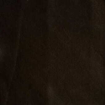 Dark brown leather texture with vertical seam, matte finish, and subtle tonal variations showing natural grain and soft, diffused lighting.