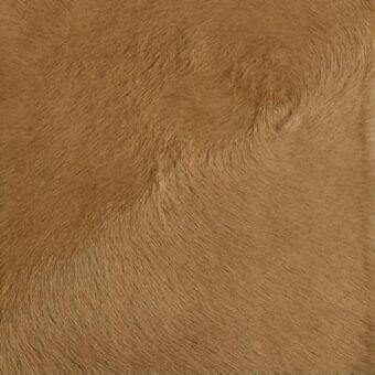 Faux fur texture sample in golden-brown, dense pile with curled fibers, displaying uniform color and subtle tonal variations; text reads “mariani…cherokee”.