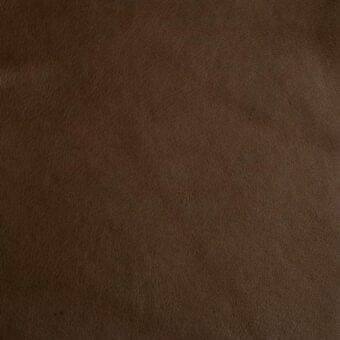 Dark brown leather texture with a pebbled grain, matte finish, and subtle creasing; imprinted text reads “mariani > leather > pa – leather atelier > pa matisse”.