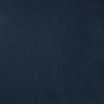 Dark teal leather sample with vertical grain, matte finish, and mottled texture; label reads “mariani leather ps 3307 half grain.”