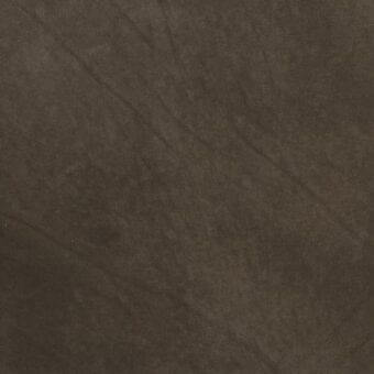 Dark brown leather texture with distressed wrinkles, matte finish, and subtle mottled grain, showing pliability and a greasy sheen.