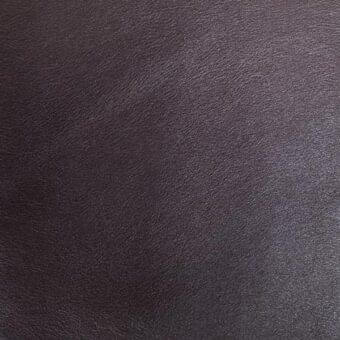 Dark purple leather texture with fine grain, matte finish; Mariani brand label visible, indicating quality and collection details.
