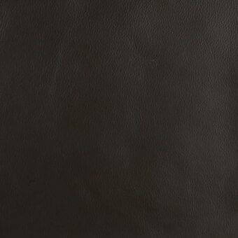 Dark brown leather texture with a fine pebbled grain, matte finish, and subtle tonal variations; embossed text reads “mariani leather px nibbio”.