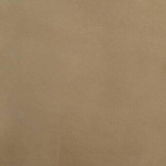 Brown leather texture sample with uniform grain, displaying a matte finish and subtle porosity, identified as Mariani pampa leather.