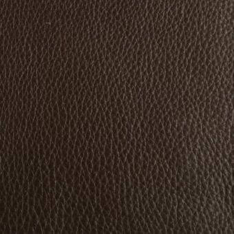Dark brown leather texture, “px Volga,” displays a dense, pebbled grain with fine lines and a matte finish for a durable appearance.