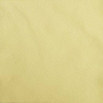 Pale yellow leather texture sample displaying a dense grain pattern, mottled tone, smooth matte finish, and subtle creases across the surface.
