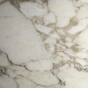 Calacatta Oro marble texture with white base, gray and beige irregular veining, polished finish, and natural mineral variations.