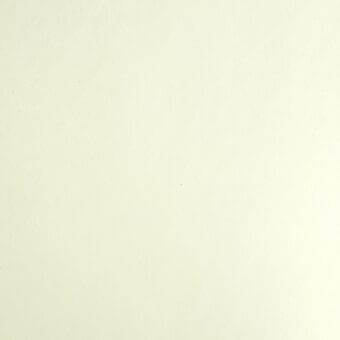 Off-white paper texture with warm ivory tones, displaying subtle variations and small dark speckles across a flat, evenly lit surface.