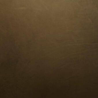 Dark brown vegetable-tanned saddle leather texture with mottled grain, matte finish, and subtle tonal variations; Dakota Weed pattern.