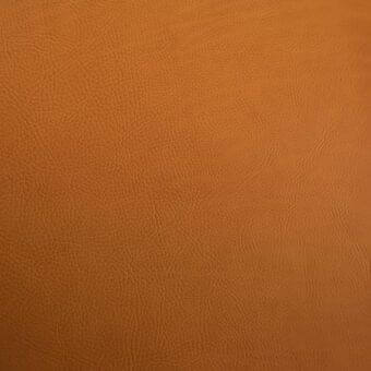 Vegetable-tanned saddle leather texture in terracotta brown, displaying a dense network of fine wrinkles and a matte, subtly-sheened finish.