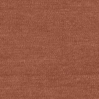 Terracotta fabric sample displaying a dense, granular texture with a muted rusty orange tone and subtle mottled variations, suitable for indoor use.