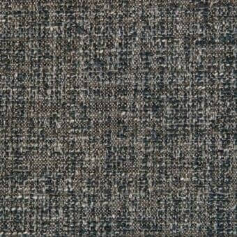 Charcoal gray woven fabric with heathered beige and navy threads, exhibiting a nubby texture and irregular plain weave for indoor use.
