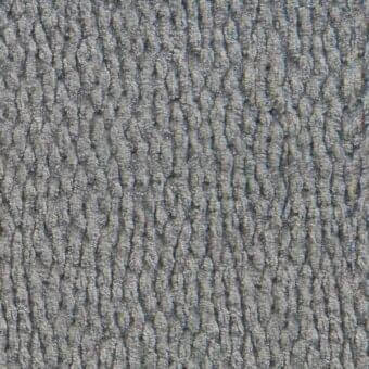 Gray upholstery fabric texture, rounded protrusions in vertical rows, Arketipo collection indoor fabric 110630004924, soft cushioned material.