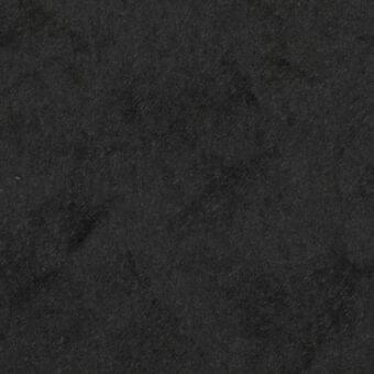 Dark gray fabric texture with a mottled surface and subtle granular pattern, featuring lighter gray distressed markings and a matte finish.