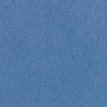 Medium blue fabric sample with dense, granular texture and matte finish, displaying a uniform speckled appearance and consistent coloration.