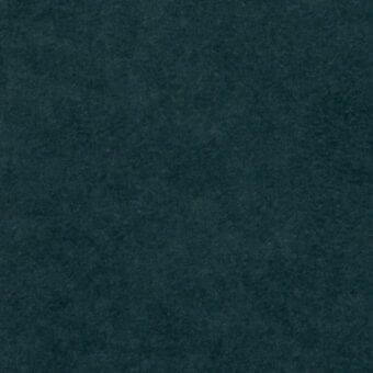 Teal fabric sample with dense, raised texture and consistent color, displaying “arketipo” fabric identification text in the lower right corner.
