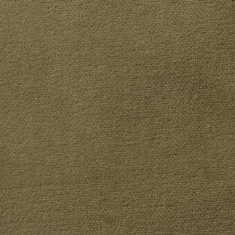 Olive-green fabric sample with dense woven texture, matte finish, and visible “arketipo” label; indoor fabric, potentially durable construction.