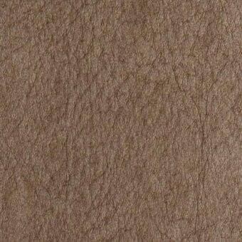 Brown leather texture with dense wrinkles and creases, exhibiting a matte, fibrous surface and subtle tonal variations.