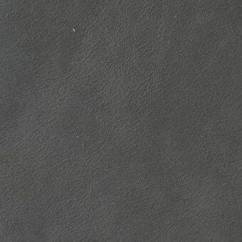 Dark gray leather texture with a pebbled grain, matte finish, and subtle distressing; sample tag reads “arketipo > leather > pelle a > 110030002610”.