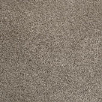 Leather texture sample, warm gray, fine granular surface; consistent matte finish with minimal reflection, possibly suede or treated leather.