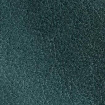Dark teal leather texture, natural grain pattern, matte finish, dense irregular lines, slightly wrinkled surface, durable appearance.