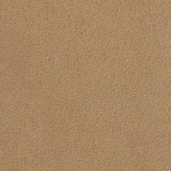Leather texture sample, tan suede finish, dense granular nap with imprinted text “arketipo > leather > pelle b > 110030003151”.