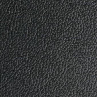 Dark gray pebbled leather texture with repeating bumps, matte finish, and tight grain; “arketipo > leather > pelle first > 110030004080” label.